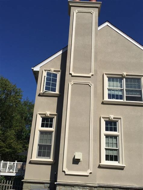 Eifs Siding for a Rustic Exterior with a Siding Stone Veneer ...