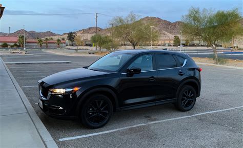 Blacked out the rims today! Looking to tint the windows next. Thoughts ...