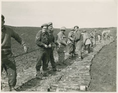 South African 6th Armored Division standing on a road they created from ...