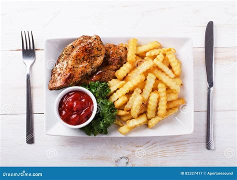 Fried Chicken on a Plate with French Fries Stock Image - Image of ...