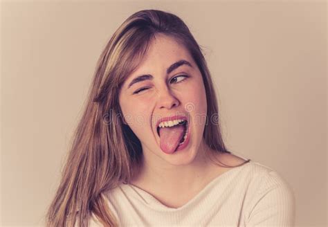 Happy Young Attractive Teenager Making Funny Face. in Fun and Positive ...