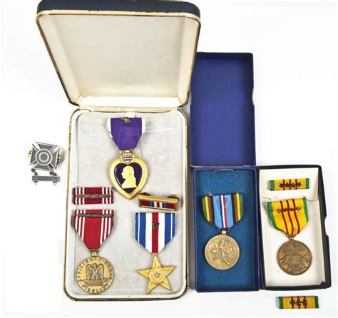 Sold at Auction: Named Vietnam War Medal Group w/ Purple Heart