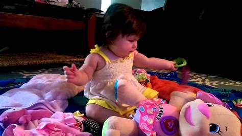 Molly playing with her toys. - YouTube