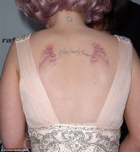 Kelly Osbourne shows faded back tattoo that was tribute to her mother ...