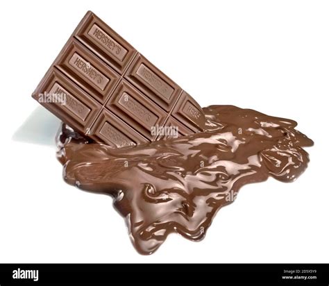 Half-melted bar of Hershey's chocolate photographed on a white ...