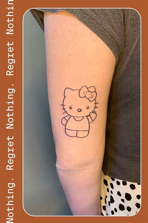 Hello Kitty Tattoo On Arm