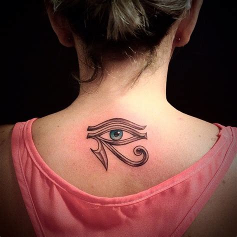 Mystical ancient Egyptian symbol the Eye of Horus tattoo on lady"s ...