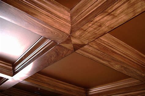 Interesting idea. Something to consider Paint the ceiling a wood color ...