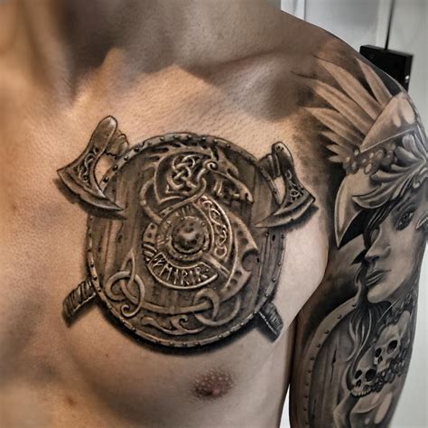 Tattoo models A shield on the chest | Chest tattoos for women, Shield ...