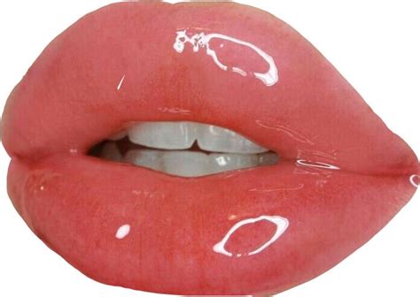 a close up view of the lip of a woman with white paint on her lips