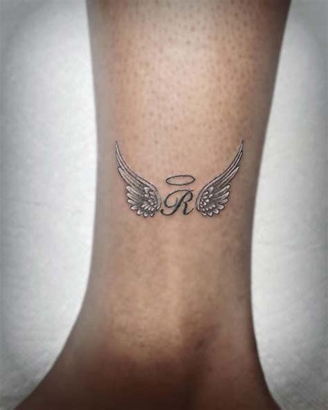 Top 10 angel wings initial tattoo ideas and inspiration