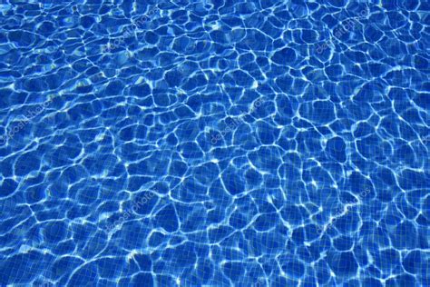 Blue water texture, tiles pool in sunny day — Stock Photo © lunamarina ...