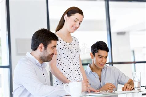 Group of Happy Young Business People in a Meeting Stock Photo - Image ...