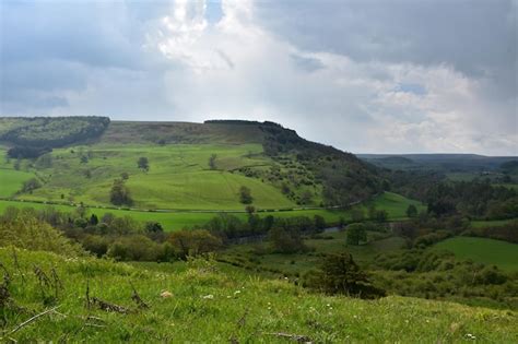 Free Photo | Farm Landscape in Northern England Under Cloudy Skies