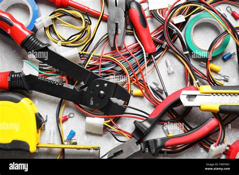 Different electrical tools on table Stock Photo - Alamy