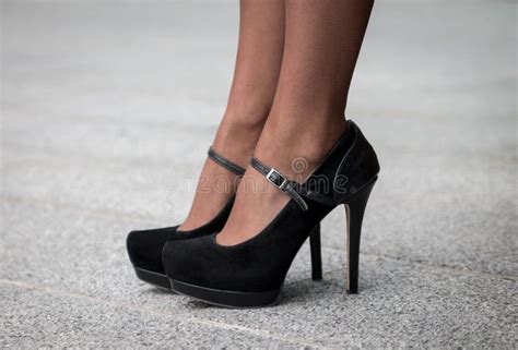 Woman Wearing a Pair of Black Classic High Heels Stock Image - Image of ...