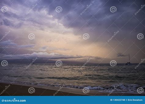 Dramatic Clouds Over Ocean Sunset with Boats As Hurricane Storm Stock ...