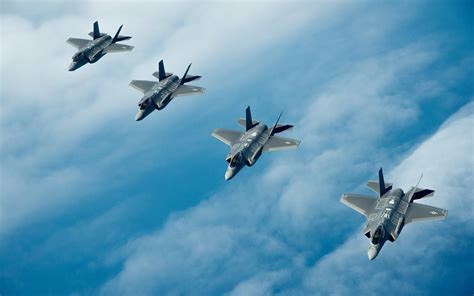 Four Lockheed Martin F-35 Lightning II in the clouds HD desktop ...