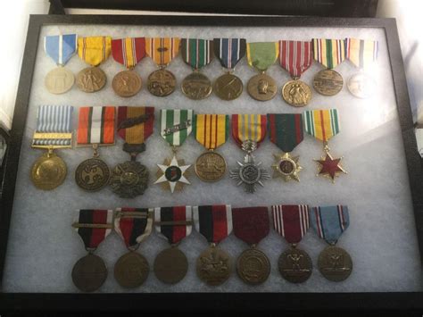 Sold Price: Collection of 25 Vietnam war medals and service medals in ...