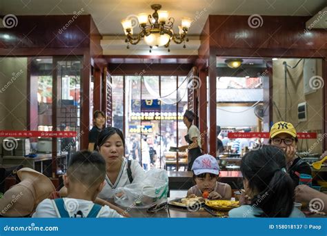 Chinese Family Dining in Restaurant Editorial Photography - Image of ...