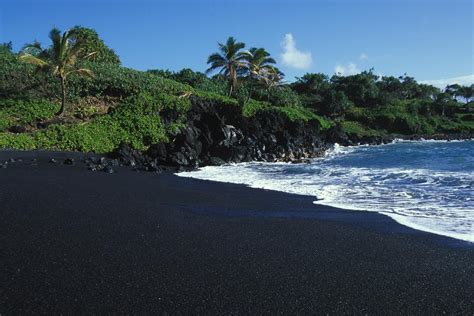 Black Volcanic Sand Beach On Hawaiis Photograph by Paul Nicklen