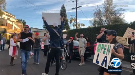 'Open LA:' Crowd gathers outside LA County public health director's ...