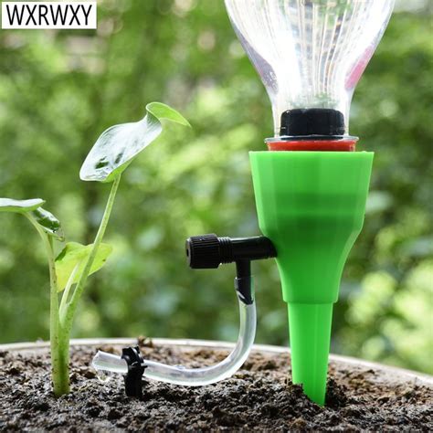 Automatic drip irrigation system DIY Automatic Plant Waterers taper ...