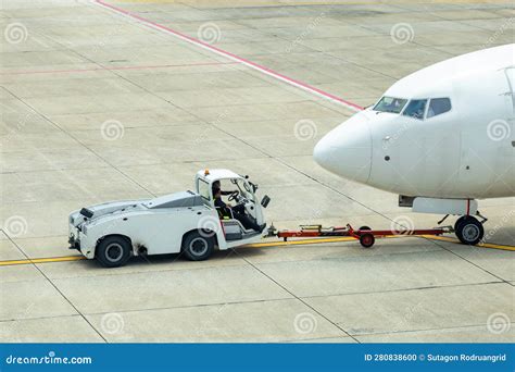 TUG Pushback Tractor With Aircraft Royalty-Free Stock Image ...