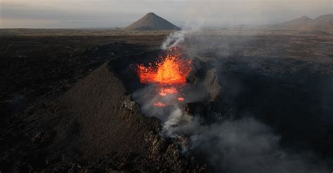 Aerial View of an Erupting Volcano · Free Stock Photo