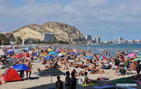 In pics: seaside in sweltering weather in Alicante, Spain - Xinhua ...