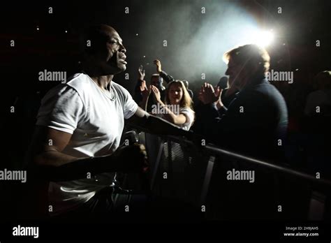 Seal performing live on stage at the O2 Arena in London Stock Photo - Alamy