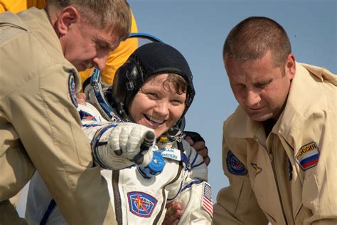 Soyuz capsule safely returns three space station crew members to Earth ...