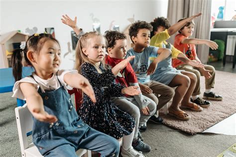 Children Sitting on Chairs inside the Classroom · Free Stock Photo