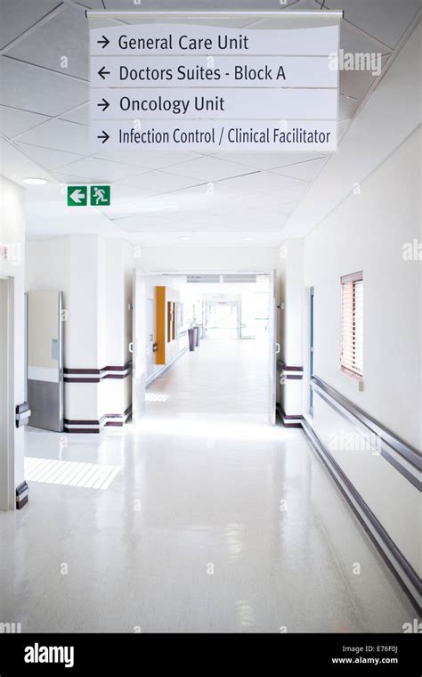 Signs in hospital hallway Stock Photo - Alamy