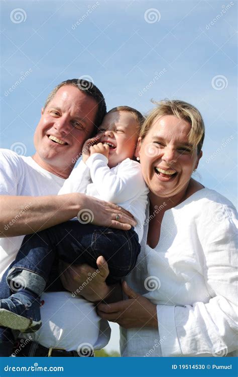 Happy smiling family stock photo. Image of hold, woman - 19514530