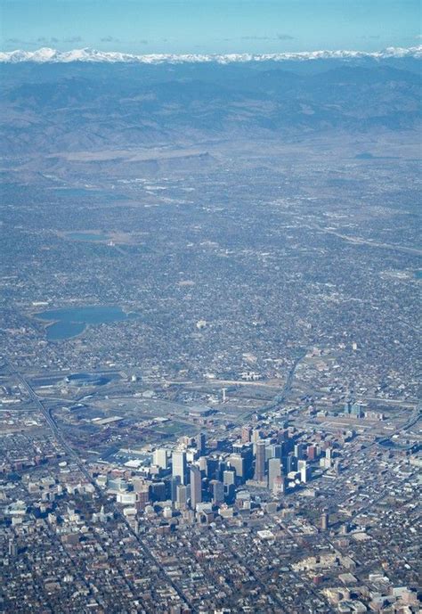 Aerial view of The Mile High City and the Rocky Mountains. #denver # ...