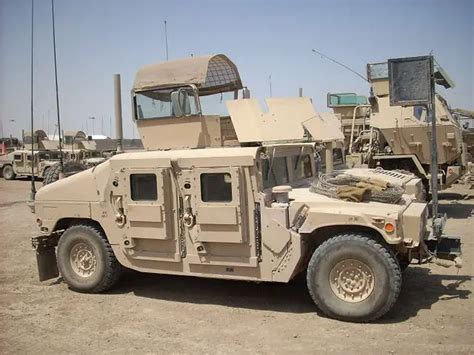 M1114 up-armored HMMWV Humvee armament carrier armour kit technical ...