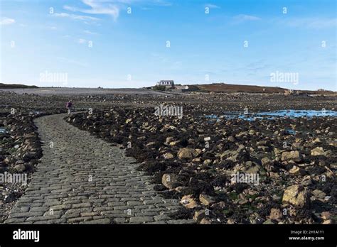 dh LIHOU ISLAND GUERNSEY Causeway to islands building Stock Photo - Alamy