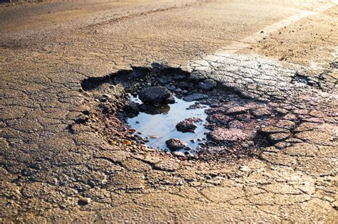 When to Use Cold Mix and Hot Mix Asphalt to Fix Potholes - Reliable ...