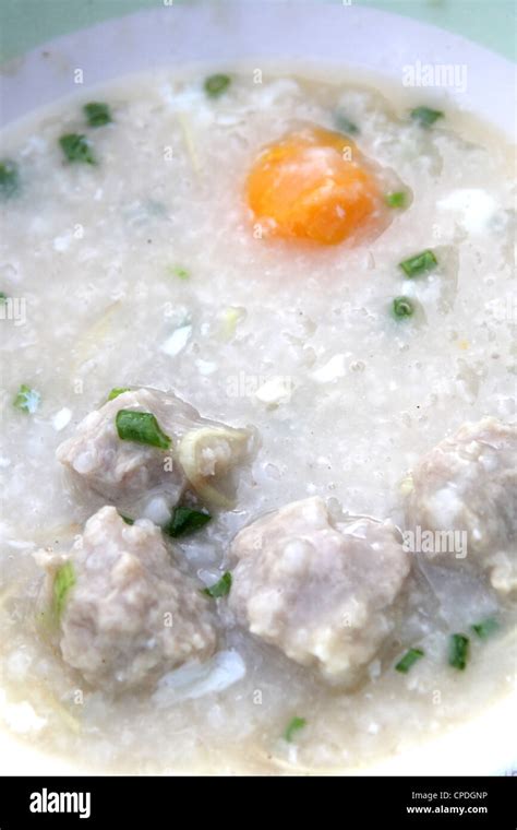 Rice soup with egg and mince pork Stock Photo - Alamy