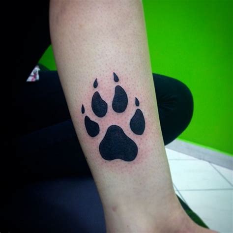 15 Coolest & Unusual Paw Print Tattoo Designs