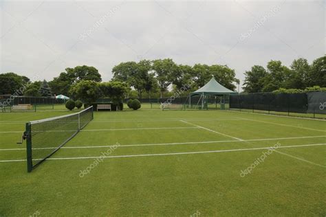 Grass tennis courts — Stock Photo © zhukovsky #78579472