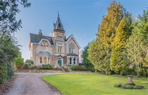 A Victorian Gothic mansion with a turret room, an Aga, and a staircase ...