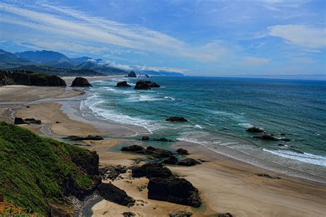 Beach at Ecola State Park Photograph by Dale Kauzlaric