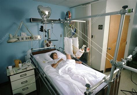 Young woman lying in hospital bed - Stock Image M540/0068 - Science ...