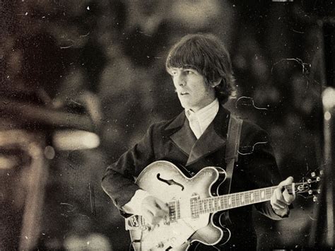 What song did George Harrison use to learn slide guitar?