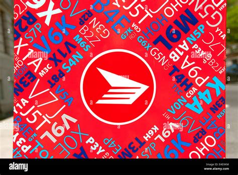 Canada Post logo on the side of a mailbox Stock Photo - Alamy