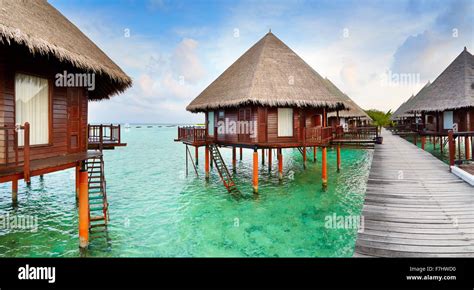 Bungalows at Maldives Island Stock Photo - Alamy