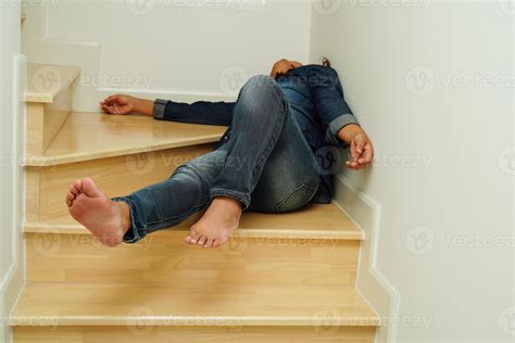 Asian lady woman injuries from falling down on slippery surfaces stairs ...