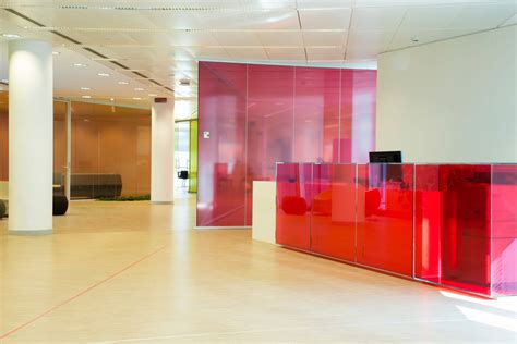 Astellas offices colored glass partition walls | VetroIn glass walls